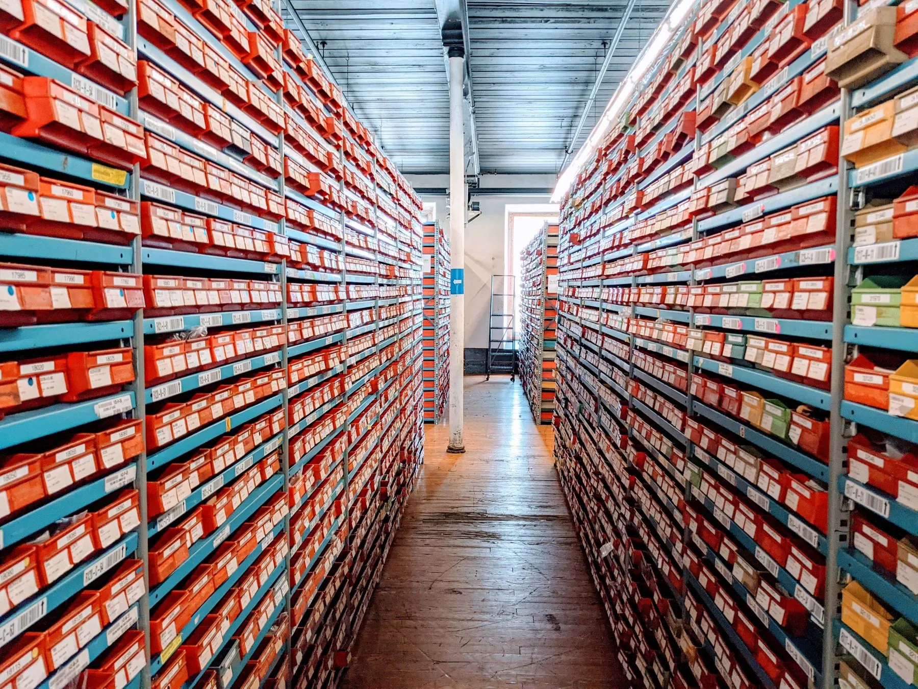 Shelves of shoe boxes in a warehouse
