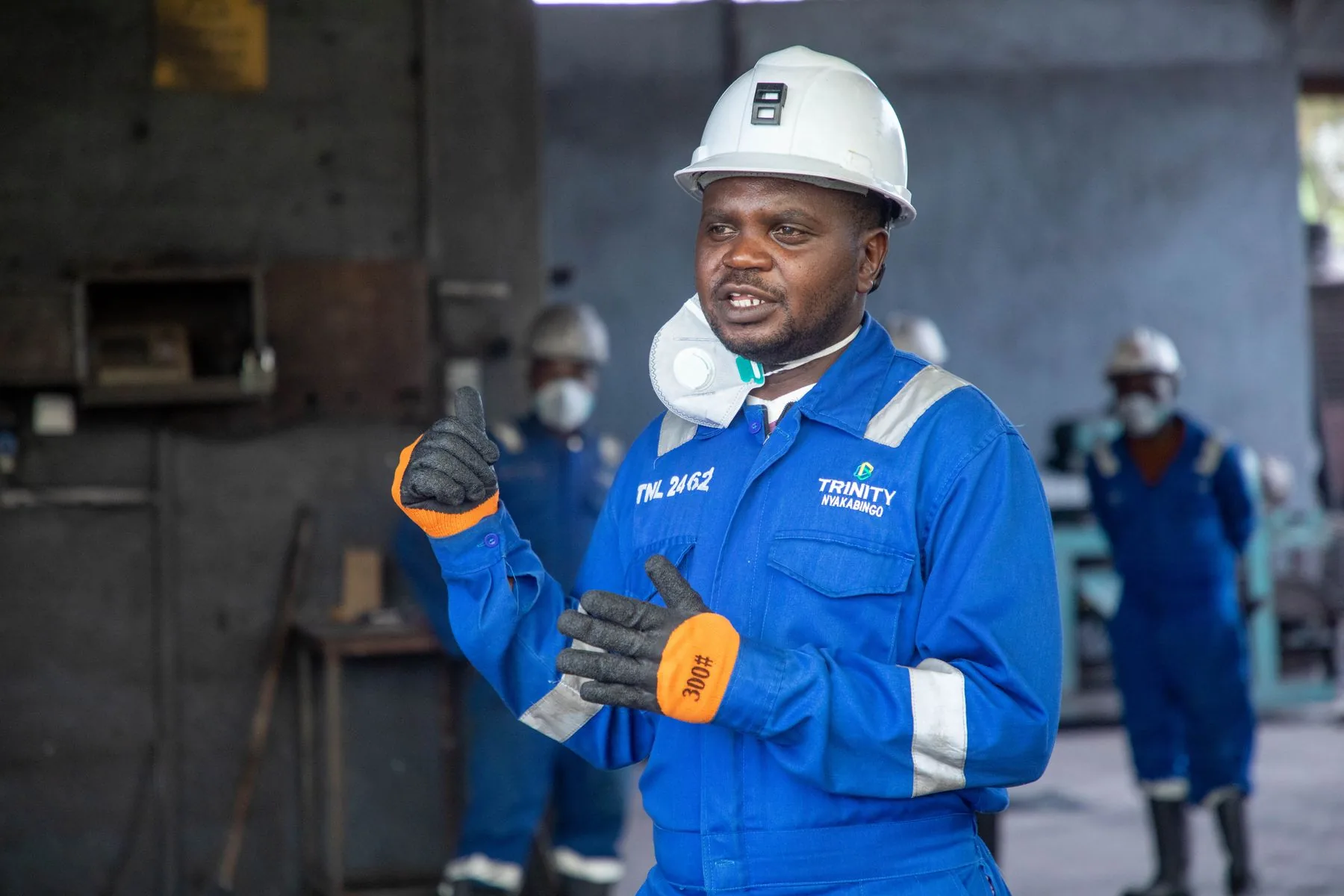 An industrial worker wearing protective equipment